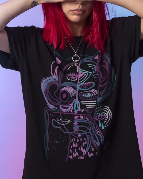 Young girl with pink hairs crossing her hands to her face
